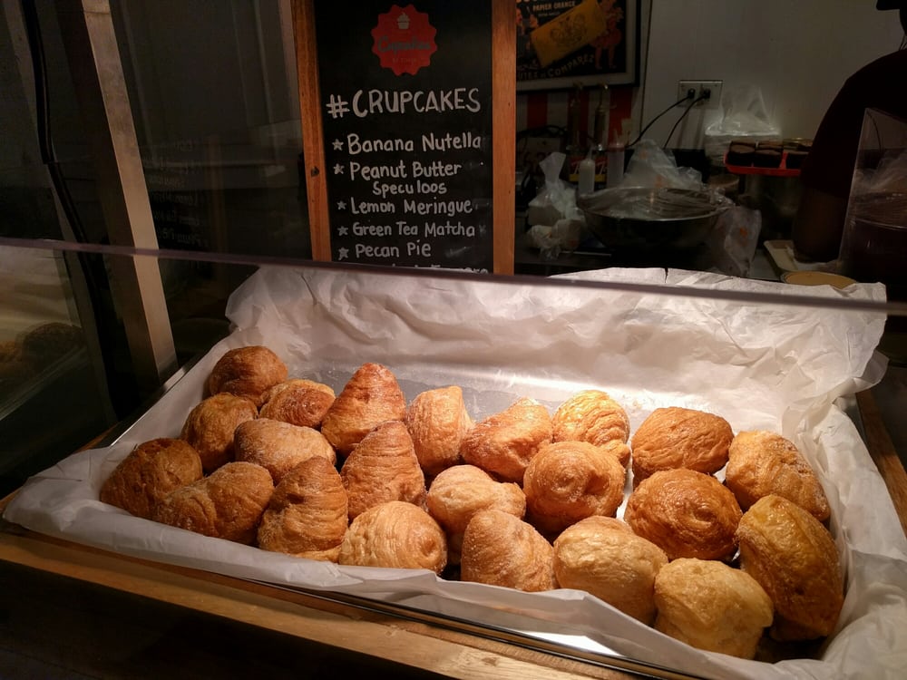 Freshly baked croissants and crupcakes with flavor menu